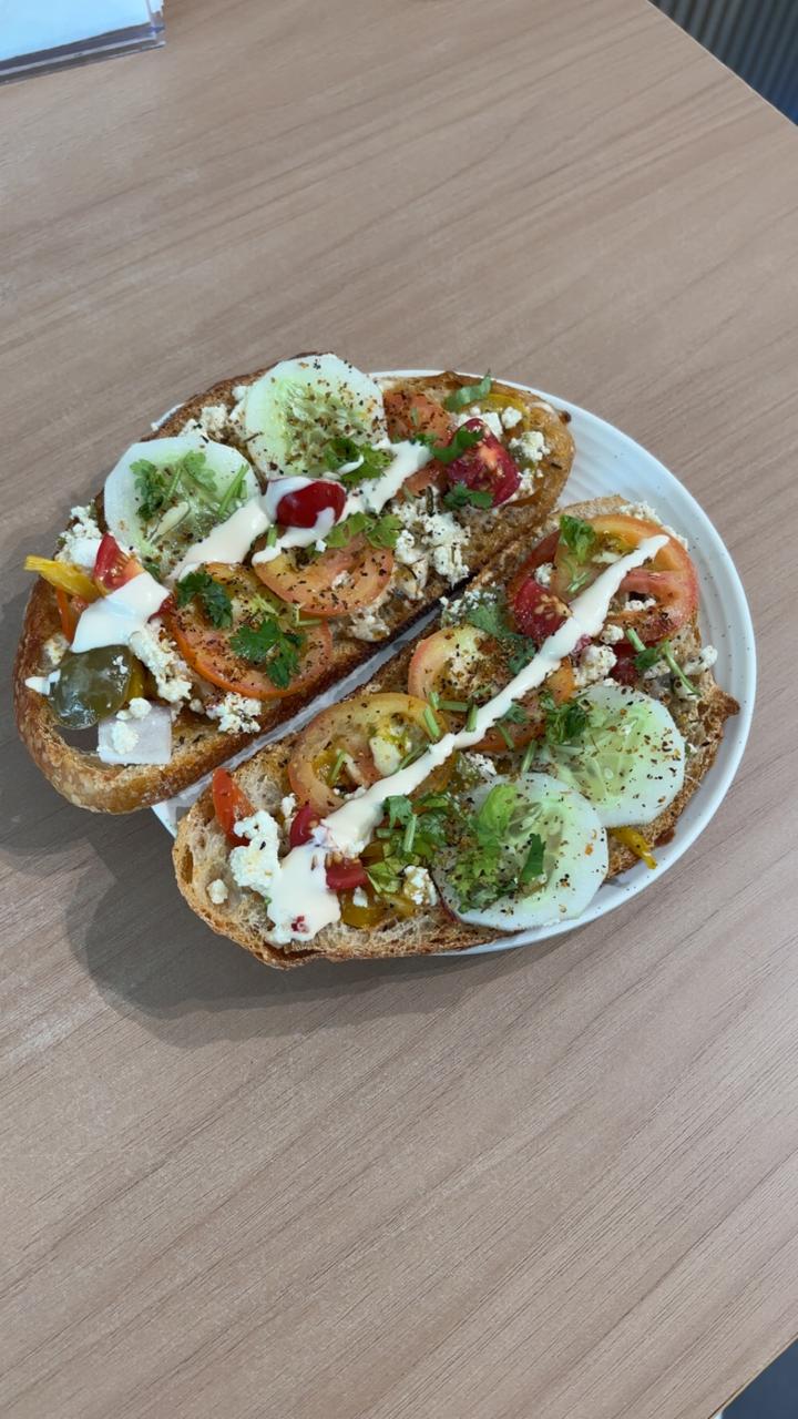 Classic vegetable toast topped with cucumber, tomato and paneer