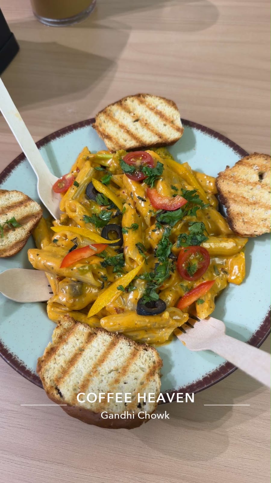 Mix sauce penne pasta with vegetables and toasted bread